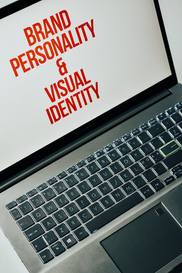 services-03 Laptop screen showing text on brand personality and visual identity for marketing strategy.